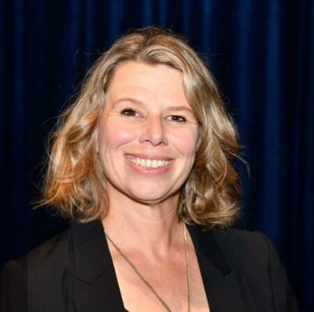 Head shot of Dr Anna Miles smiling