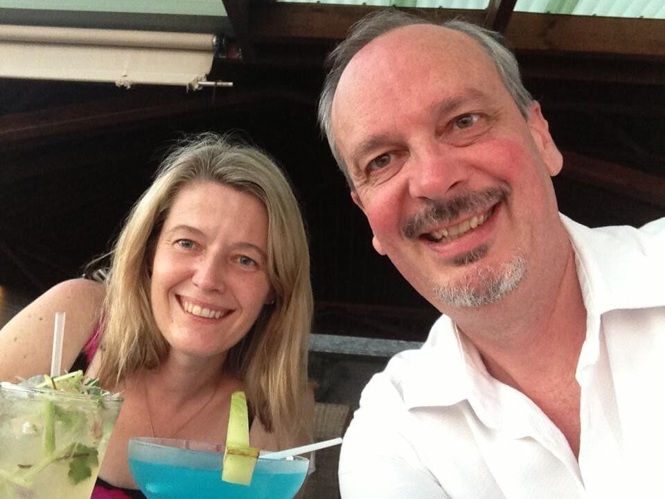 photo of Raewyn and Geoff Hughes smiling together